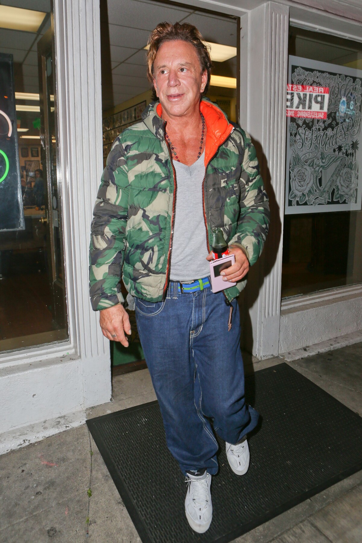 Photo : Once again today Mickey Rourke stopped by another tattoo shop ...