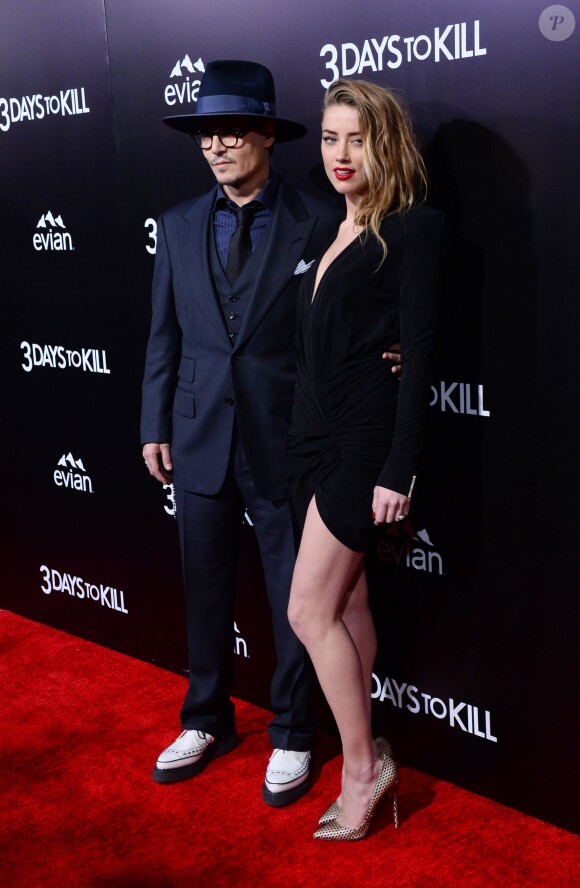 Johnny Depp et Amber Heard lors de la présentation du film 3 Days To Kill à Los Angeles le 12 février 2014