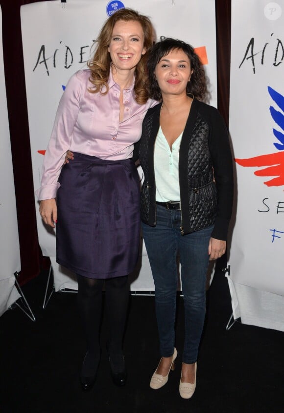 Valérie Trierweiler et Saïda Jawad lors du gala de clôture du Don'actions du Secours Populaire au Musée des Arts Forains à Paris, le 28 mars 2014