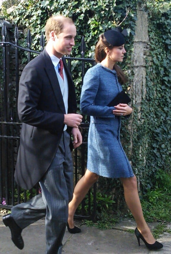Le prince William et Kate Middleton, en manteau Missoni, lors du mariage de Lucy Meade et Charlie Budgett, le 29 mars 2014 à Marshfield, dans le Gloucestershire.