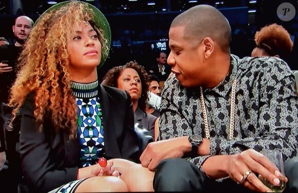 Beyoncé et Jay Z assitent au match entre les Brooklyn Nets et les Houston Rockets. Brooklyn, le 1er avril 2014.