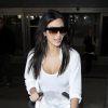 Kim Kardashian, souriante à son arrivée à Los Angeles. Le 2 avril 2014.