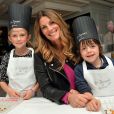 Exclusif - Sophie Thalmann et ses enfants Charlie et Mika lors d'un goûter de Pâques "Tout Chocolat" à l'Hôtel de Vendôme à Paris le 9 avril 2014.