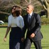 Barack Obama et son épouse Michelle de retour à la Maison Blanche à Washington après avoir assisté à Austin (Texas) à un sommet pour commémorer le 50e anniversaire de la signature du Cival Rights Act de 1964. Le 10 avril 2014.