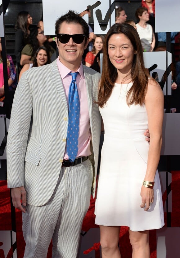 Johnny Knoxville et son épouse sur le tapis rouge de la cérémonie des MTV Movie Awards à Los Angeles, le 13 avril 2014.