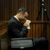 Oscar Pistorius, lors de son procès pour le meurtre de Reeva Steenkamp, le 18 mars 2014 à Pretoria