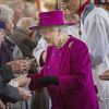 La reine Elizabeth II, accompagnée par son époux le duc d'Edimbourg, était le 17 avril 2014 à Blackburn, dans le Lancashire, pour le Jeudi saint.