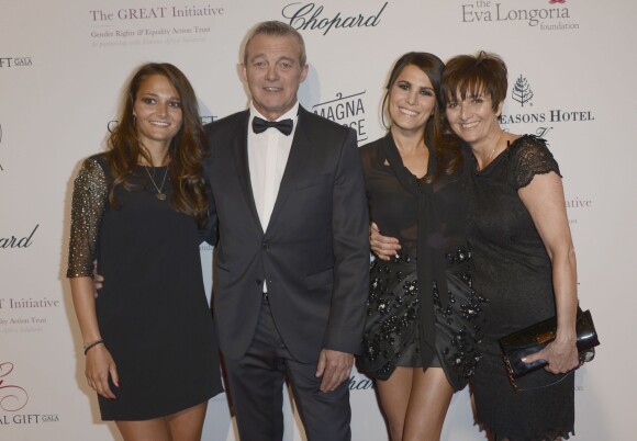 Karine Ferri, Pierre Lemarchal avec sa femme Laurence et sa fille Leslie, en mai 2013, à Paris 