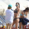 Katie Cassidy et ses amies s'éclatent sur une plage de Miami. Le 1er mai 2014.