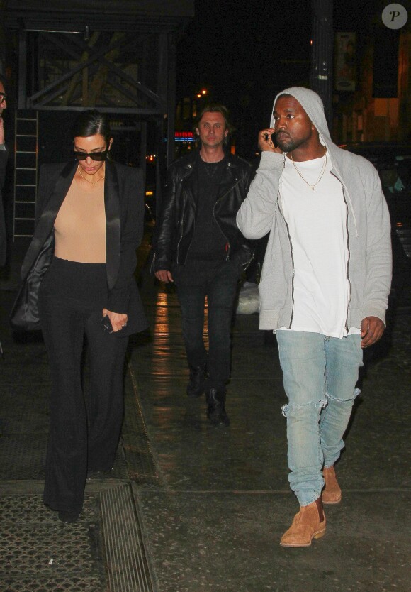 Kanye West et Kim Kardashian, en compagnie de Jonathan Cheban, meilleur ami de Kim, dans les rues du quartier de Soho à New York, le 4 mai 2014.