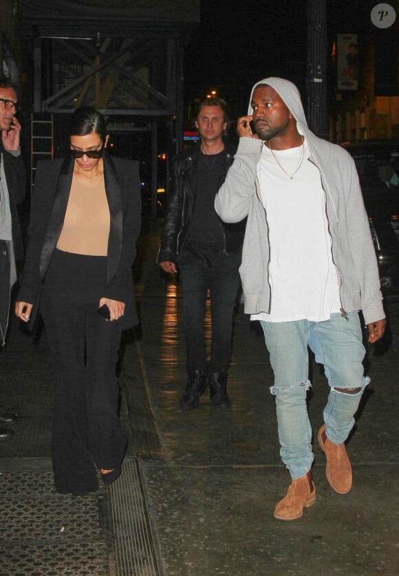 Kim Kardashian et le rappeur Kanye West, en compagnie de Jonathan Cheban, meilleur ami de Kim, dans les rues du quartier de Soho à New York, le 4 mai 2014.
