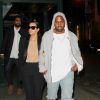 Kim Kardashian et Kanye West, en compagnie de Jonathan Cheban, meilleur ami de Kim, dans les rues du quartier de Soho à New York, le 4 mai 2014.