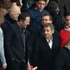 Nicolas Sarkozy et Arthur lors du match du PSG perdu face à Rennes (2-1), le 7 mai 2014 au Parc des Princes à Paris