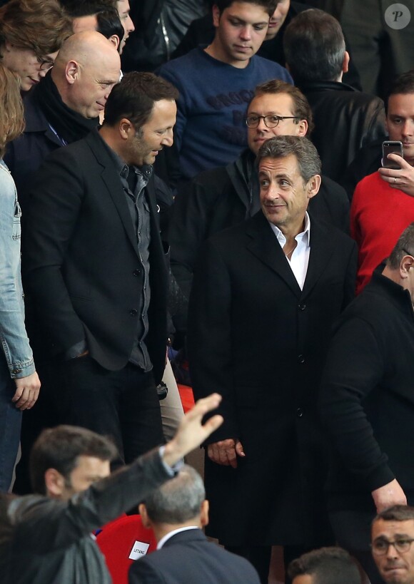 Nicolas Sarkozy et Arthur lors du match du PSG perdu face à Rennes (2-1), le 7 mai 2014 au Parc des Princes à Paris