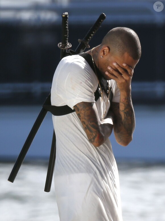 Exclusif Chris Brown passe son temps libre, alors qu'il est sur le tournage de son nouveau clip vidéo, avec son ex mais aussi nouvelle compagne Karrueche Tran a Hawaii. Le 26 aot 2013 