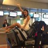 Eva Longoria pose avec ses bagages, à l'aéroport de Nice, le 14 mai 2014.