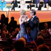 Nicole Kidman et Lambert Wilson s'offrent une danse pendant la cérémonie d'ouverture du 67e festival international du film de Cannes, le 14 mai 2014.