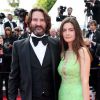Frédéric Beigbeder et sa femme Lara Micheli lors de la montée des marches du film Saint Laurent et l'hommage au cinéma d'animation, durant le Festival de Cannes le 17 mai 2014