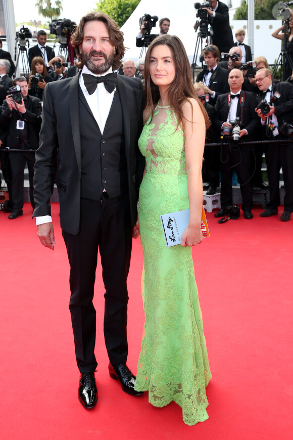 Frédéric Beigbeder et sa femme Lara Micheli lors de la montée des marches du film Saint Laurent et l'hommage au cinéma d'animation, durant le Festival de Cannes le 17 mai 2014
