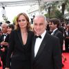 Alain Terzian et sa femme Brune de Margerie lors de la montée des marches du film Saint Laurent et l'hommage au cinéma d'animation, durant le Festival de Cannes le 17 mai 2014