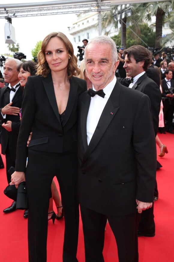 Alain Terzian et sa femme Brune de Margerie lors de la montée des marches du film Saint Laurent et l'hommage au cinéma d'animation, durant le Festival de Cannes le 17 mai 2014