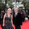 Claude Sérillon et sa compagne Catherine Ceylac lors de la montée des marches du film Saint Laurent et l'hommage au cinéma d'animation, durant le Festival de Cannes le 17 mai 2014