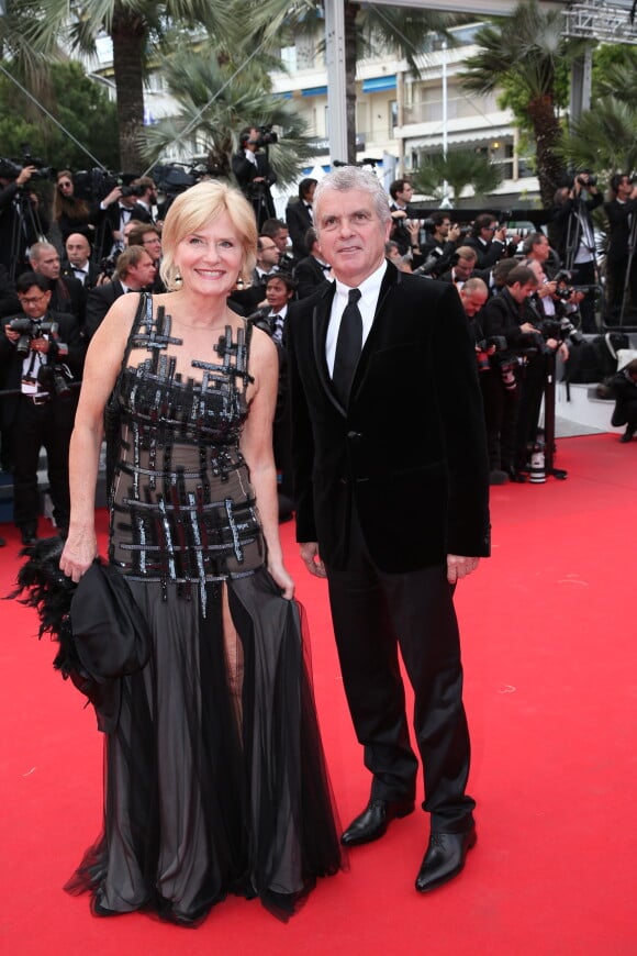 Claude Sérillon et sa compagne Catherine Ceylac lors de la montée des marches du film Saint Laurent et l'hommage au cinéma d'animation, durant le Festival de Cannes le 17 mai 2014