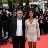 Luc Besson et Virginie Silla lors de la montée des marches du film Saint Laurent et l'hommage au cinéma d'animation, durant le Festival de Cannes le 17 mai 2014