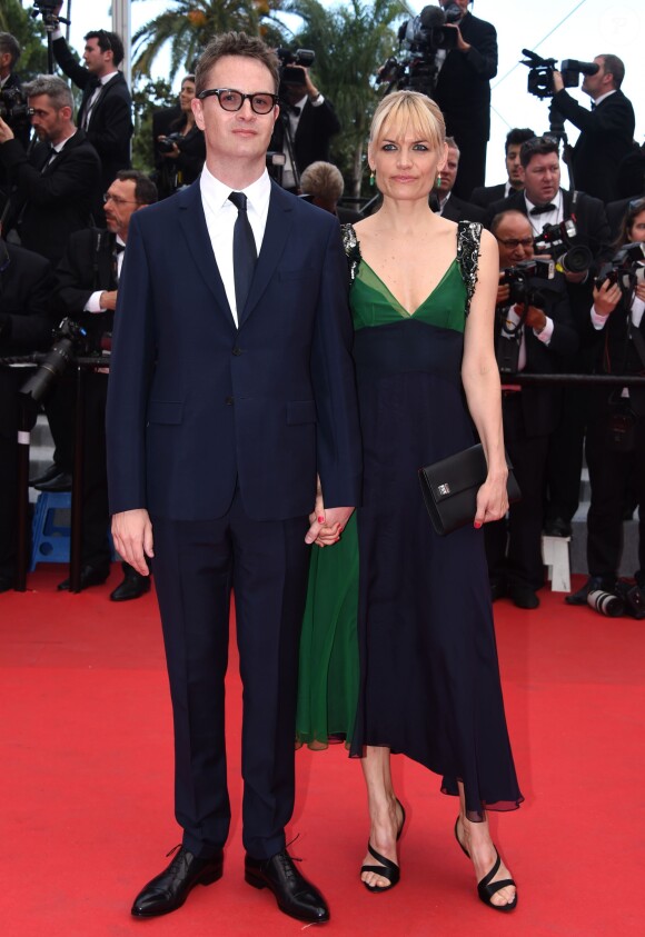 Nicolas Winding Refn et sa femme Liv Corfixen lors de la montée des marches du film Saint Laurent et l'hommage au cinéma d'animation, durant le Festival de Cannes le 17 mai 2014