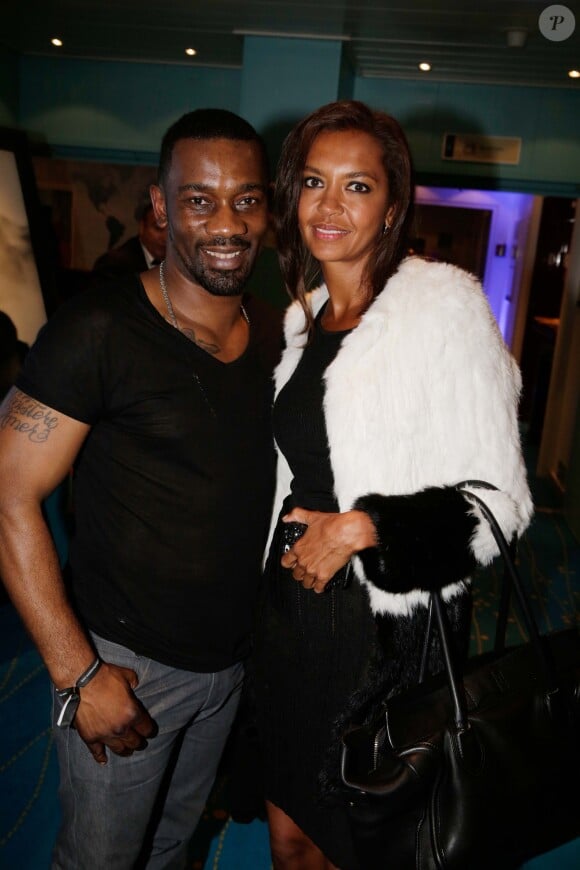 Passi et Karine Le Marchand lors de la soirée Reebok durant le Festival de Cannes le 17 mai 2014. 