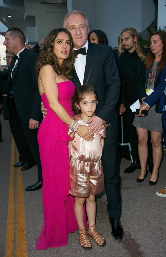 Salma Hayek, son mari François-Henri Pinault et leur fille Valentina Pinault lors de l'hommage au cinéma d'animation lors du 67e Festival du film de Cannes le 17 mai 2014