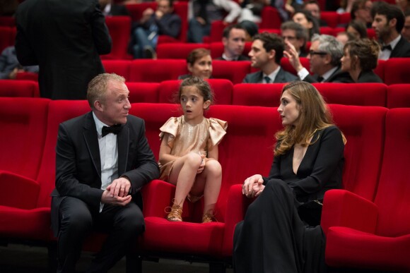 François-Henri Pinault et sa fille Valentina Pinault, Julie Gayet lors de l'hommage au cinéma d'animation lors du 67e Festival du film de Cannes le 17 mai 2014
