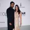 Aishwarya Rai et Abhishek Bachchan - Photocall du 21e gala de l'amfAR à l'Eden Roc au Cap d'Antibes en marge du 67e Festival du film de Cannes, le 22 mai 2014.