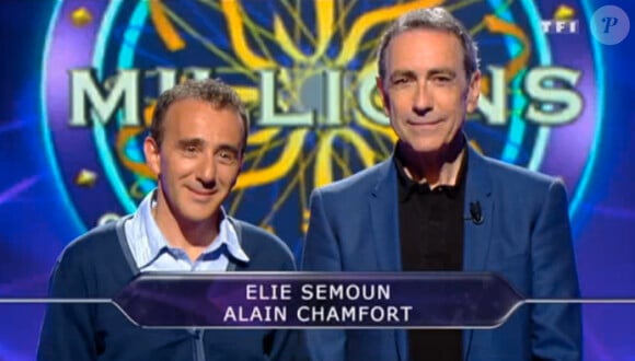 Elie Semoun et Alain Chamfort dans Qui veut gagner des millions ? sur TF1, le vendredi 23 mai 2014.