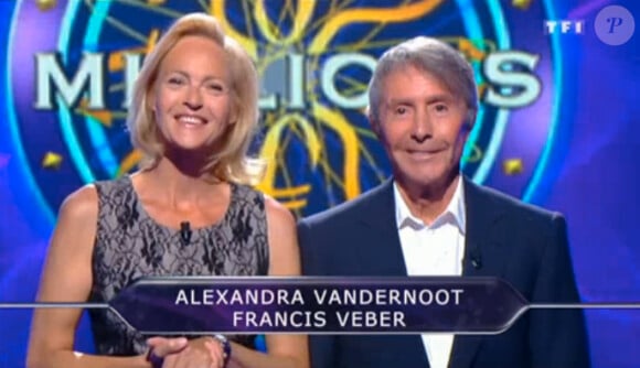 Alexandra Vandernoot et Francis Veber, dans Qui veut gagner des millions ? sur TF1, le vendredi 23 mai 2014.