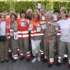 Adriana Karembeu au milieu des bénévoles à l'occasion des journées nationales de la Croix-Rouge qui fête son 150e anniversaire à Vincennes le 24 mai 2014