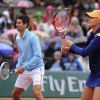 Novak Djokovic et Kristina Mladenovic lors de la journées des Enfants de Roland-Garros, à Roland-Garros, le 24 mai 2014 à Paris
