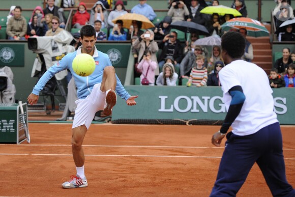 Novak Djokovic et Gaël Monfils lors de la journées des Enfants de Roland-Garros, à Roland-Garros, le 24 mai 2014 à Paris