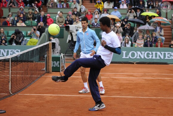 Novak Djokovic et Gaël Monfils lors de la journées des Enfants de Roland-Garros, à Roland-Garros, le 24 mai 2014 à Paris