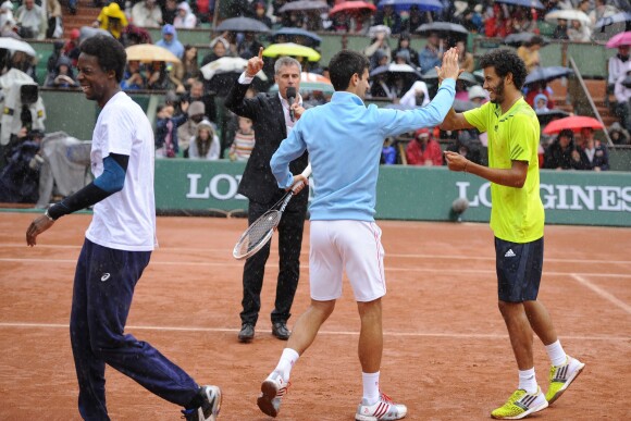Gaël Monfils, Laurent Lokoli et NOvak Djokovic lors de la journées des Enfants de Roland-Garros, à Roland-Garros, le 24 mai 2014 à Paris