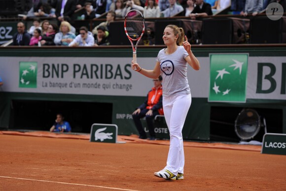 Alizé Cornet lors de la journées des Enfants de Roland-Garros, à Roland-Garros, le 24 mai 2014 à Paris