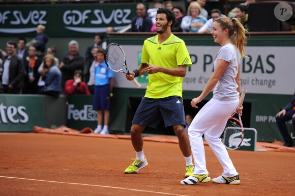 Alizé Cornet et Laurent Lokoli lors de la journées des Enfants de Roland-Garros, à Roland-Garros, le 24 mai 2014 à Paris