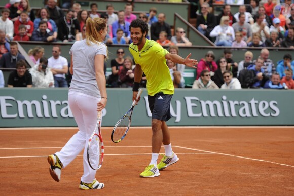 Alizé Cornet et Laurent Lokoli lors de la journées des Enfants de Roland-Garros, à Roland-Garros, le 24 mai 2014 à Paris