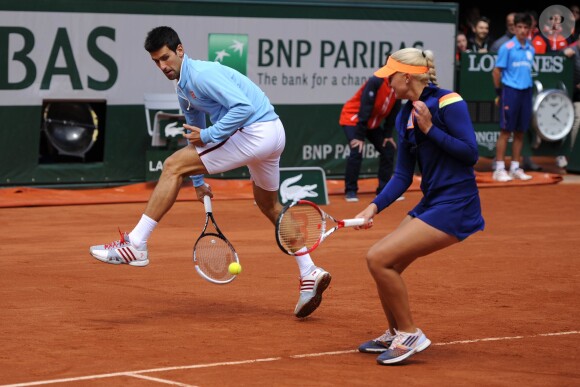 Novak Djokovic et Kristina Mladenovic lors de la journées des Enfants de Roland-Garros, à Roland-Garros, le 24 mai 2014 à Paris
