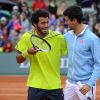 Novak Djokovic et Laurent Lokoli lors de la journées des Enfants de Roland-Garros, à Roland-Garros, le 24 mai 2014 à Paris