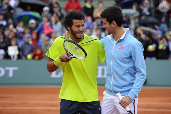 Novak Djokovic et Laurent Lokoli lors de la journées des Enfants de Roland-Garros, à Roland-Garros, le 24 mai 2014 à Paris