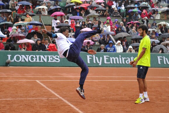 Gaël Monfils et et Laurent Lokoli lors de la journées des Enfants de Roland-Garros, à Roland-Garros, le 24 mai 2014 à Paris