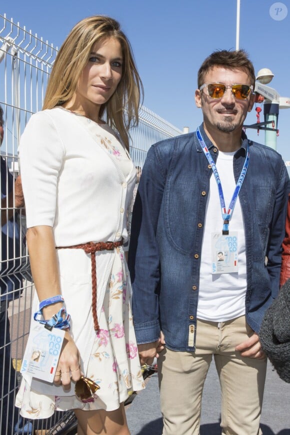 Eleonora Pedron et son compagnon Max Biaggi dans le paddock du Grand Prix de Monaco, le 25 mai 2014