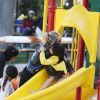 Laeticia Hallyday a passé un moment avec ses filles Jade et Joy dans un parc à Malibu. Les filles étaient très en joie....à chaque passage sur le toboggan, elles embrassaient leur mère. Le 25 mai 2014.