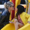 Laeticia Hallyday est allée passer un moment avec ses filles Jade et Joy dans un parc à Malibu. Les filles étaient très en joie....à chaque passage sur le toboggan, elles embrassaient leur mère. Le 25 mai 2014.